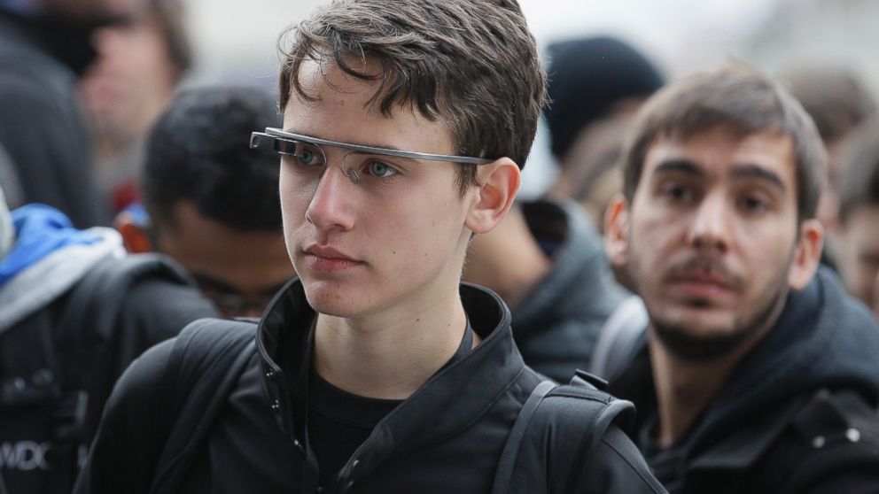 Attendees wear Google Glass at the Apple Worldwide Developers Conference in San Francisco on June 2, 2014. 