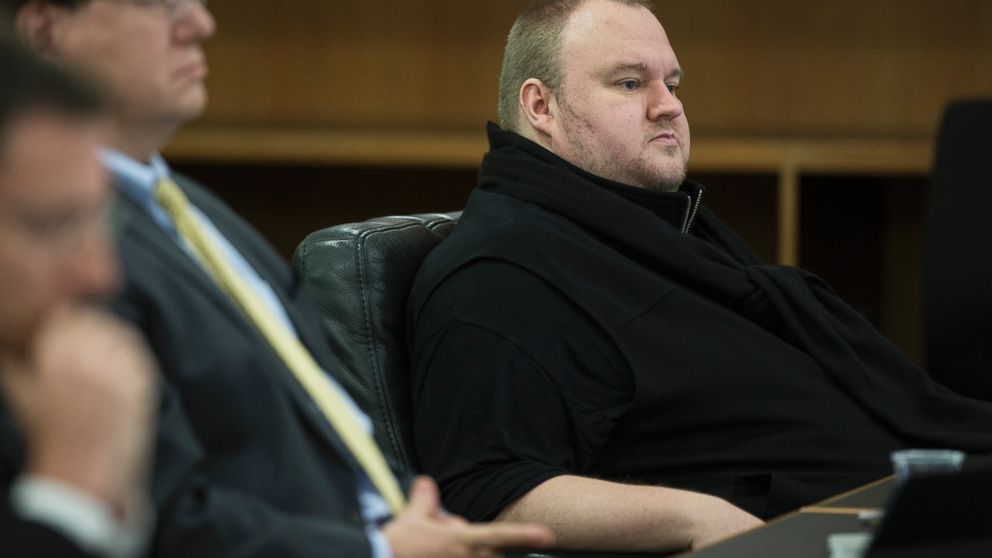 Kim Dotcom sits in the Auckland District Court during an extradition hearing in Auckland, New Zealand, Sept. 21, 2015. 