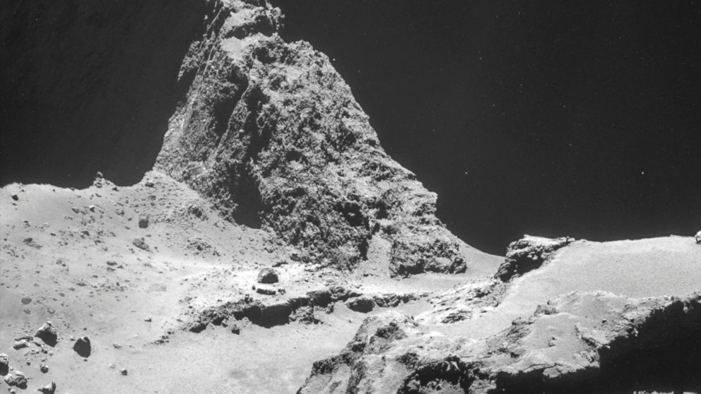 This picture, taken by the camera on-board Rosetta, shows the boulder-strewn neck region of Comet 67P/Churyumov-Gerasimenko.