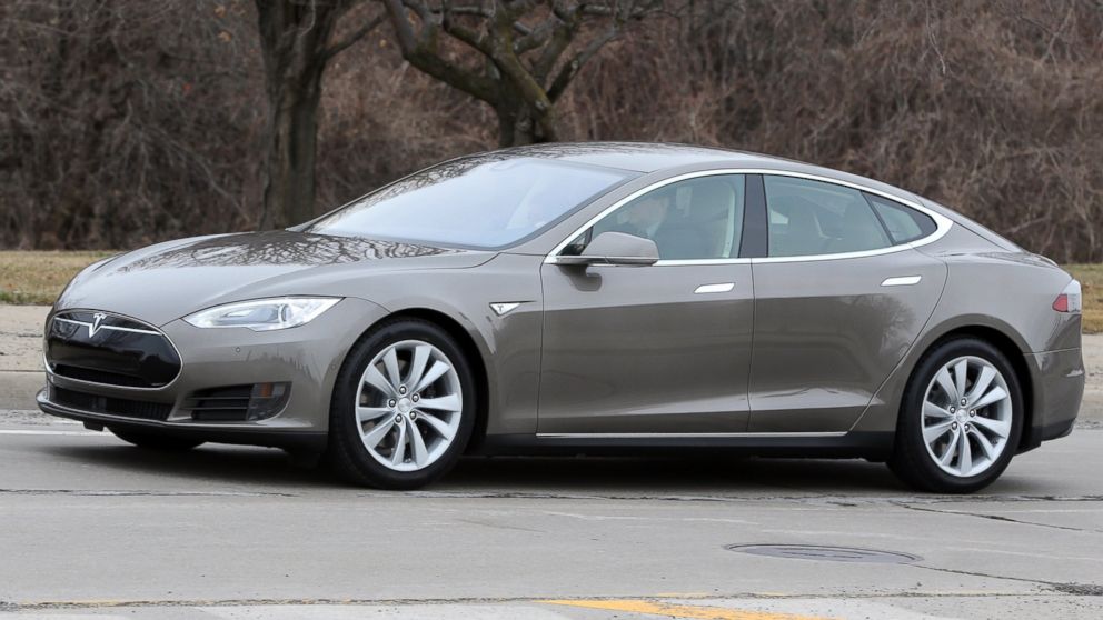 A Tesla Model S 70D is seen during a test drive, April 7, 2015, in Detroit.