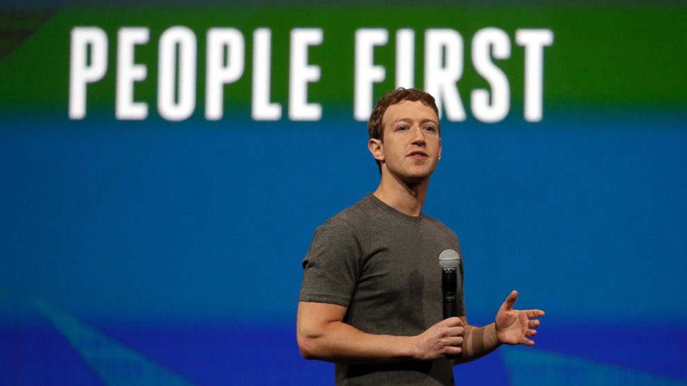 Facebook CEO Mark Zuckerberg gestures while delivering the keynote address at the f8 Facebook Developer Conference, April 30, 2014, in San Francisco, Calif.