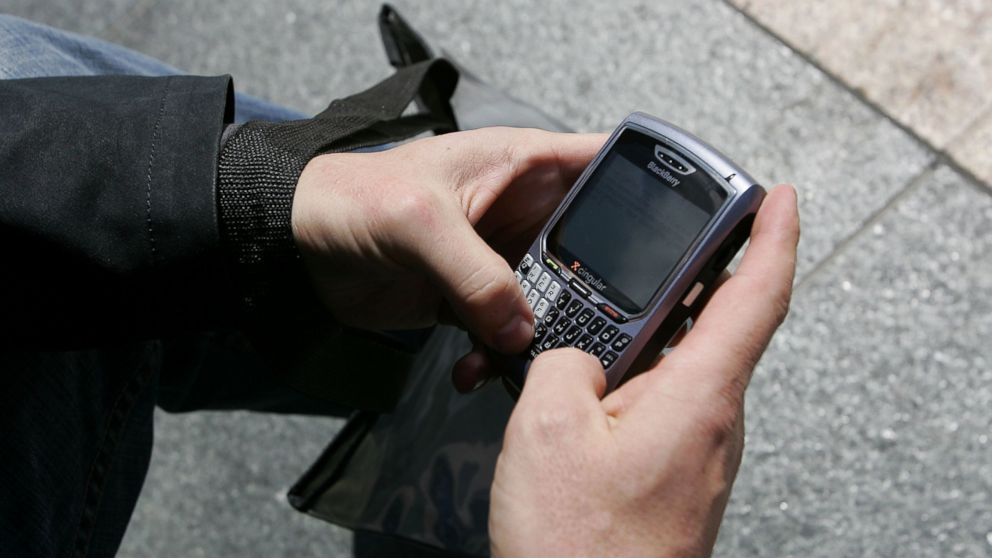 BlackBerry user Douglas Philips checks emails on his BlackBerry, April 18, 2007, in San Francisco.