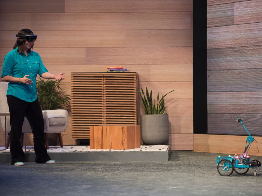 PHOTO: The Microsoft Corp. HoloLens augmented reality headset is demonstrated during a keynote session at the Microsoft Developers Build Conference in San Francisco on April 29, 2015.