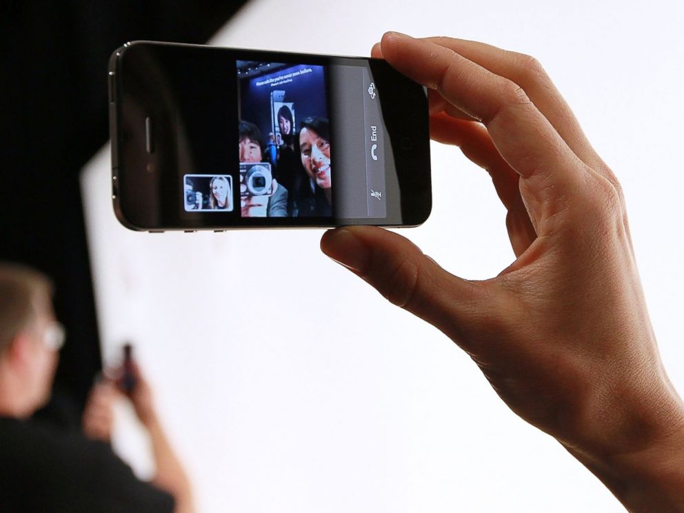 PHOTO: An Apple employee demonstrates Face Time on the new iPhone 4 at the 2010 Apple World Wide Developers conference June 7, 2010 in San Francisco, California.