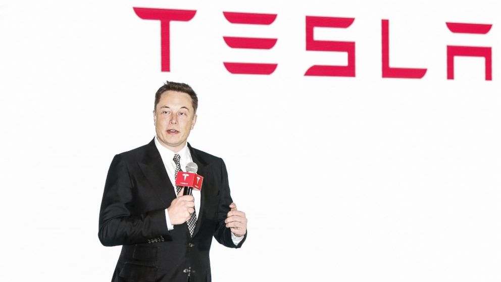 Elon Musk, Chairman, CEO and Product Architect of Tesla Motors, addresses a press conference to declare that the Tesla Motors releases v7.0 System in China on a limited basis for its Model S, which will enable self-driving features such as Autosteer for a select group of beta testers, Oct. 23, 2015 in Beijing, China. 