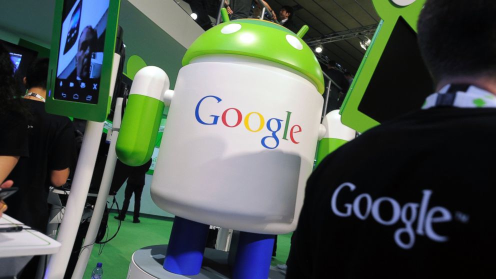 PHOTO: An Android operating software icon sits on display with a Google Inc. logo at the Google booth at the Mobile World Congress in Barcelona, Feb. 29, 2012.