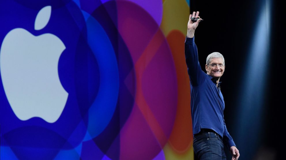 In this file photo, Tim Cook, chief executive officer of Apple Inc., waves before speaking during the Apple World Wide Developers Conference (WWDC) in San Francisco, Calif, U.S., June 8, 2015.  