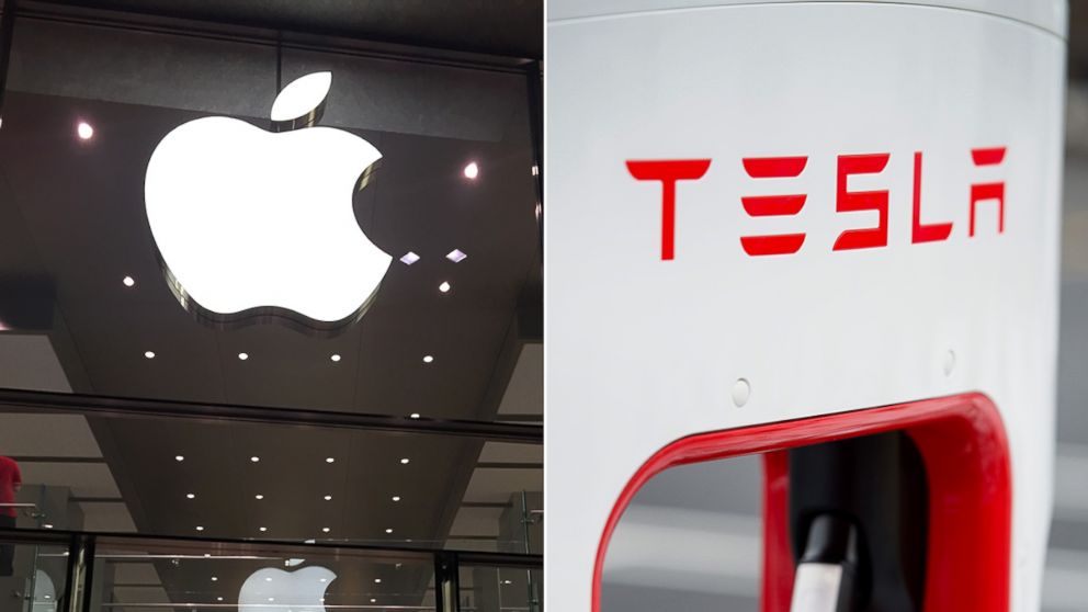Apple's logo, left, and Tesla's logo, right, are pictured. 