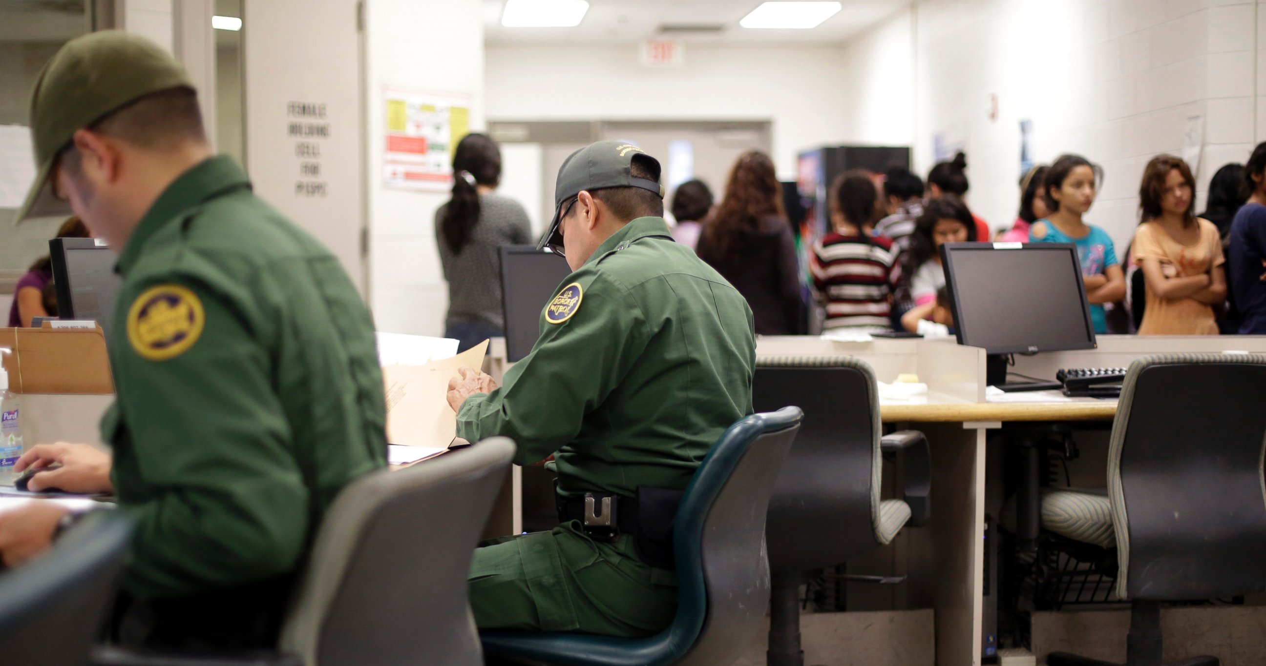 PHOTO: U.S. Customs and Border Protection agents work at a processing facility, June 18, 2014, in Brownsville,Texas.
