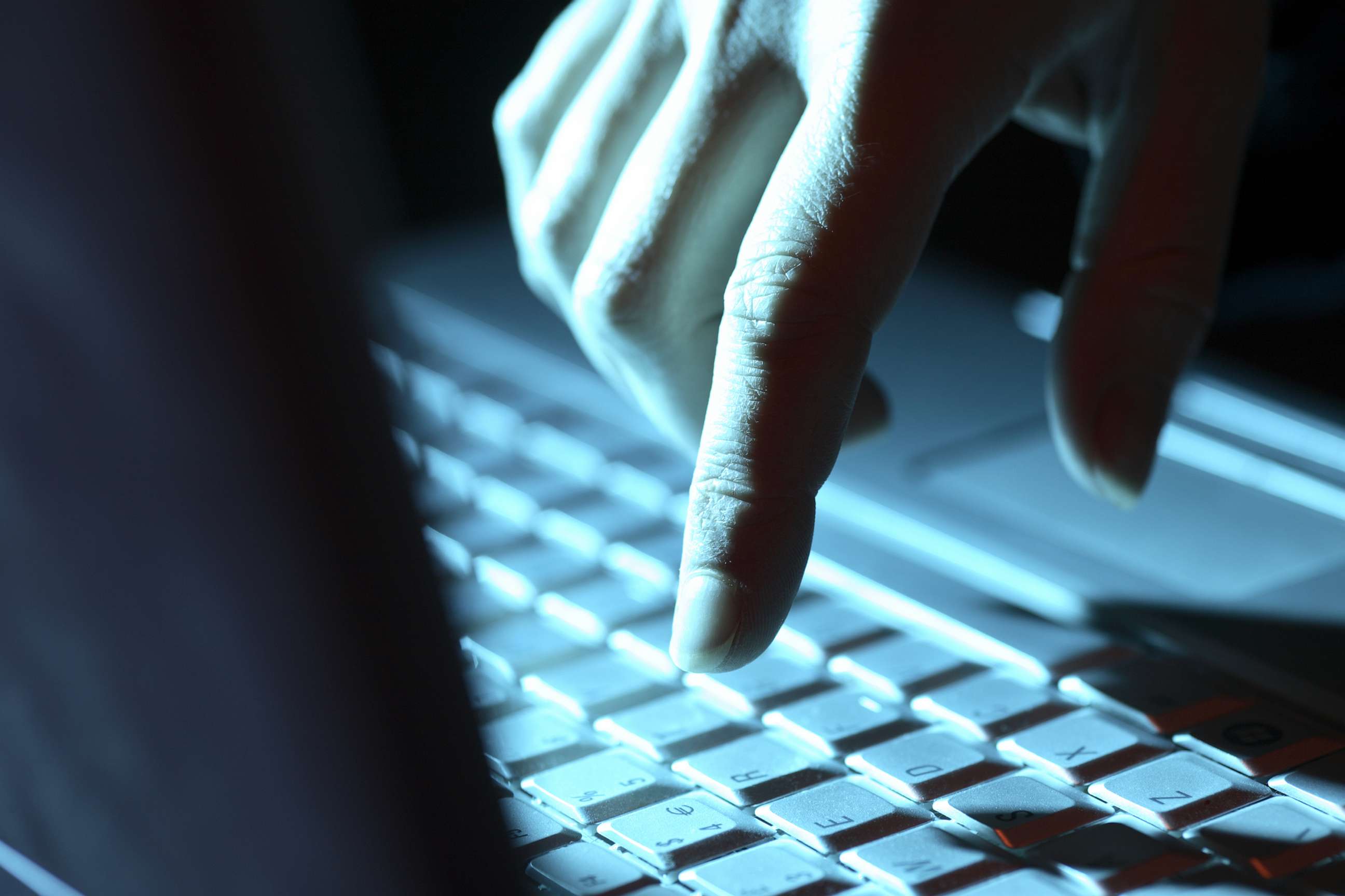 PHOTO: A person touches a keyboard in this stock image.