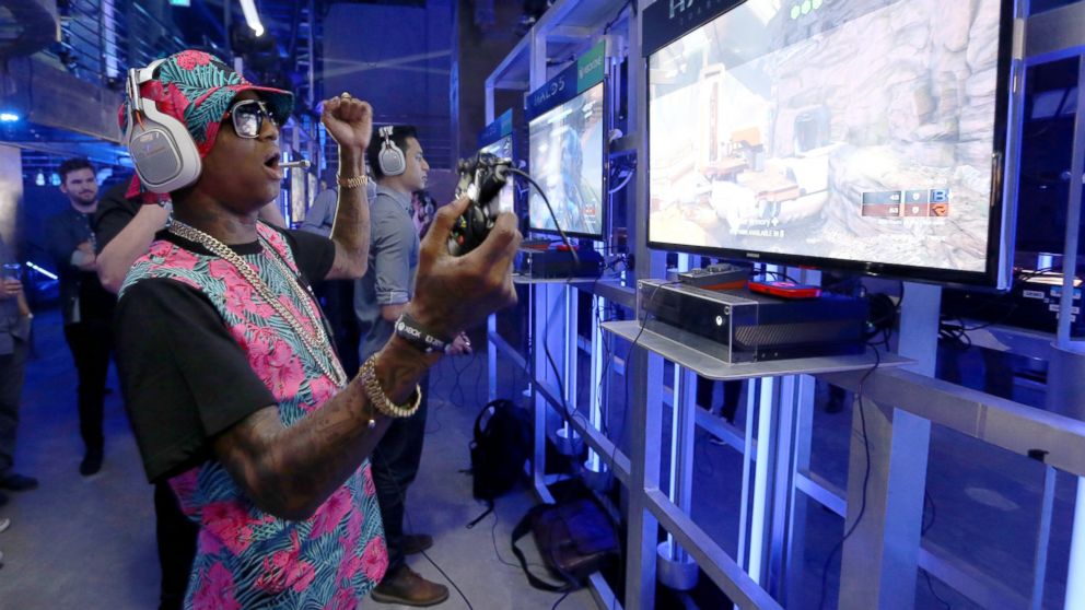 Rapper Soulja Boy plays Halo 5 during the Xbox One E3 Showcase Party at The Majestic Downtown, June 15, 2015, in Los Angeles.