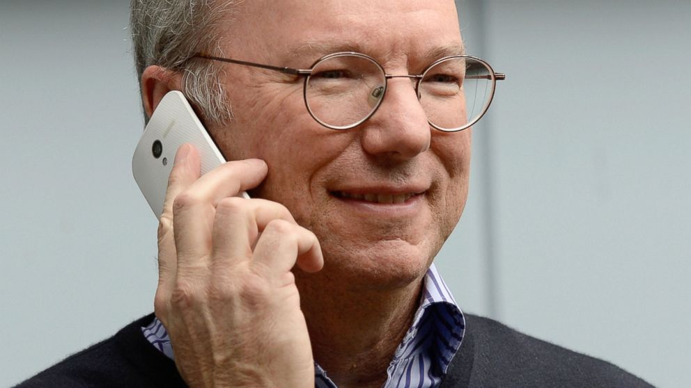 Eric Schmidt, executive chairman of Google, makes a call on a Moto X phone during the Allen & Co. annual conference July 11, 2013, in Sun Valley, Idaho.