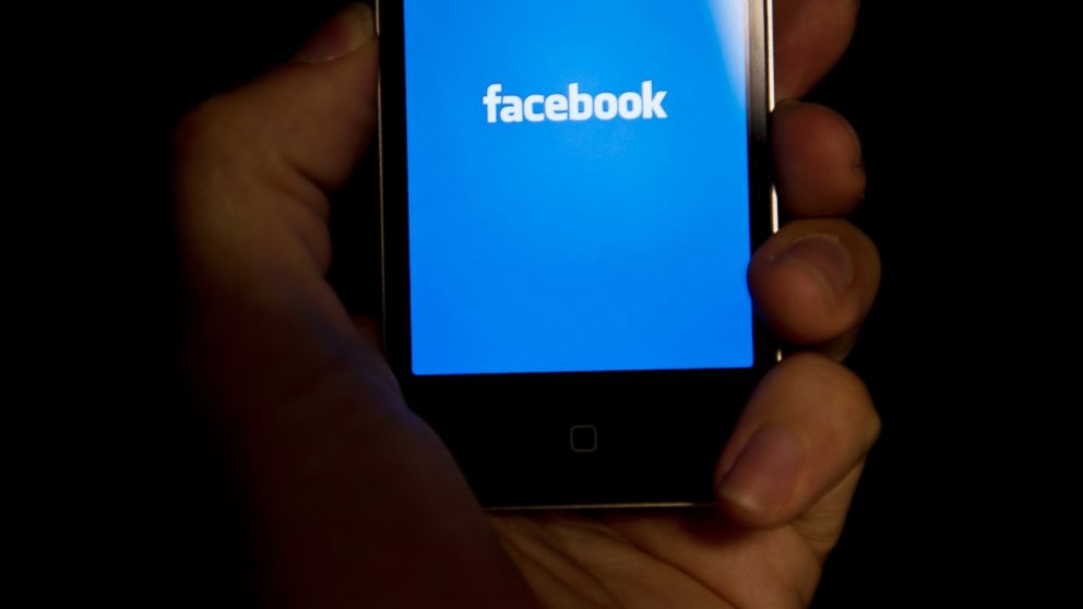 A view of an Apple iPhone displaying the Facebook app's splash screen in Washington, May 10, 2012.