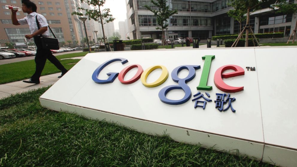 A pedestrian walks past Google Inc.'s China headquarters in Beijing, China in this June 29, 2010 file photo.