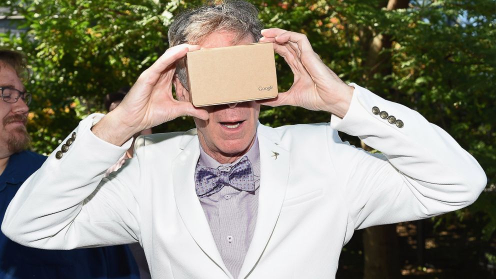 "Miles from Tomorrowland" voice actor Bill Nye experiences the Google Cardboard VR headset on July 16, 2015 in New York City. 