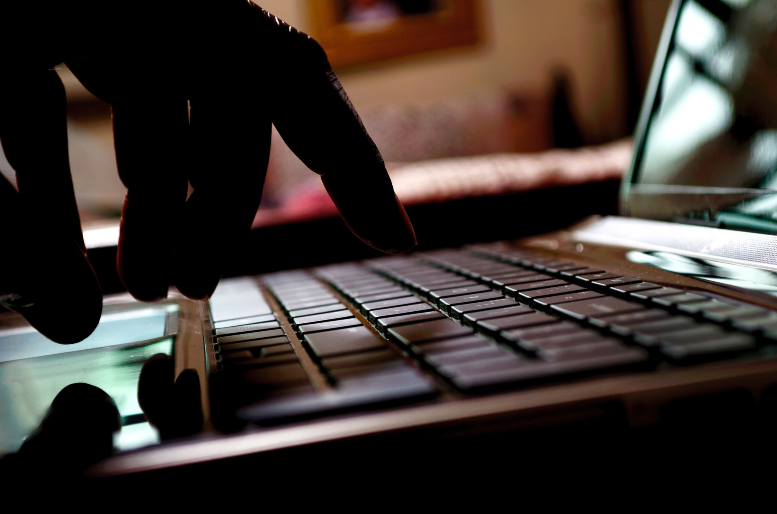 PHOTO: A hacker types on a laptop in this stock image.