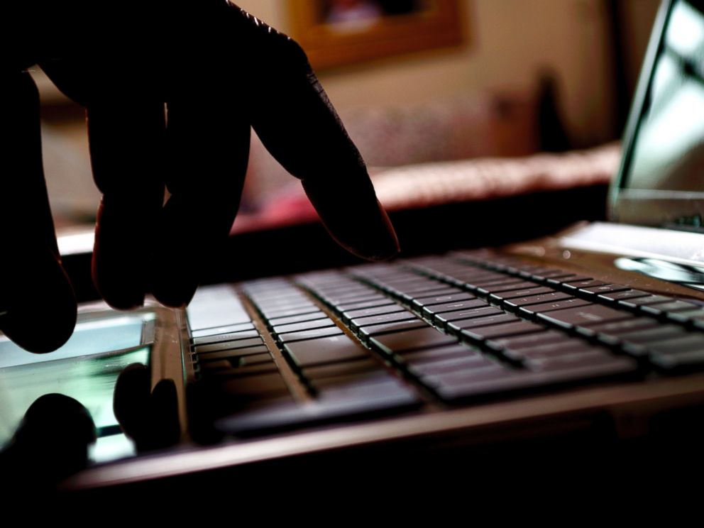 PHOTO: A hacker types on a laptop in this stock image.