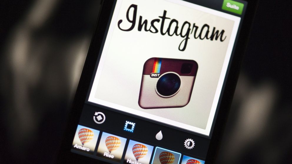 The Instagram logo is displayed on a smartphone in this Dec. 20, 2012 file photo in Paris. 