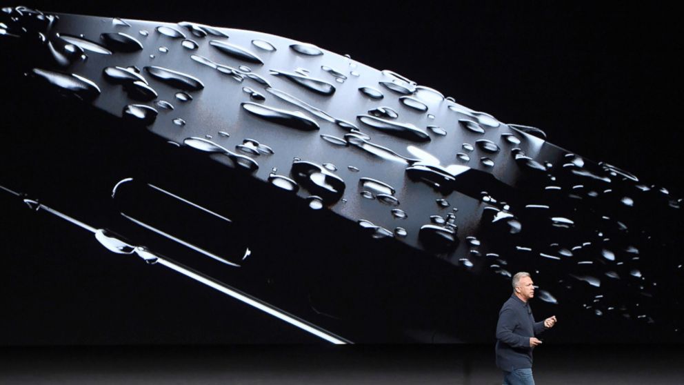 PHOTO: Philip "Phil" Schiller, senior vice president of worldwide marketing at Apple Inc., unveils the new iPhone 7 during an event in San Francisco, Sept. 7, 2016. 