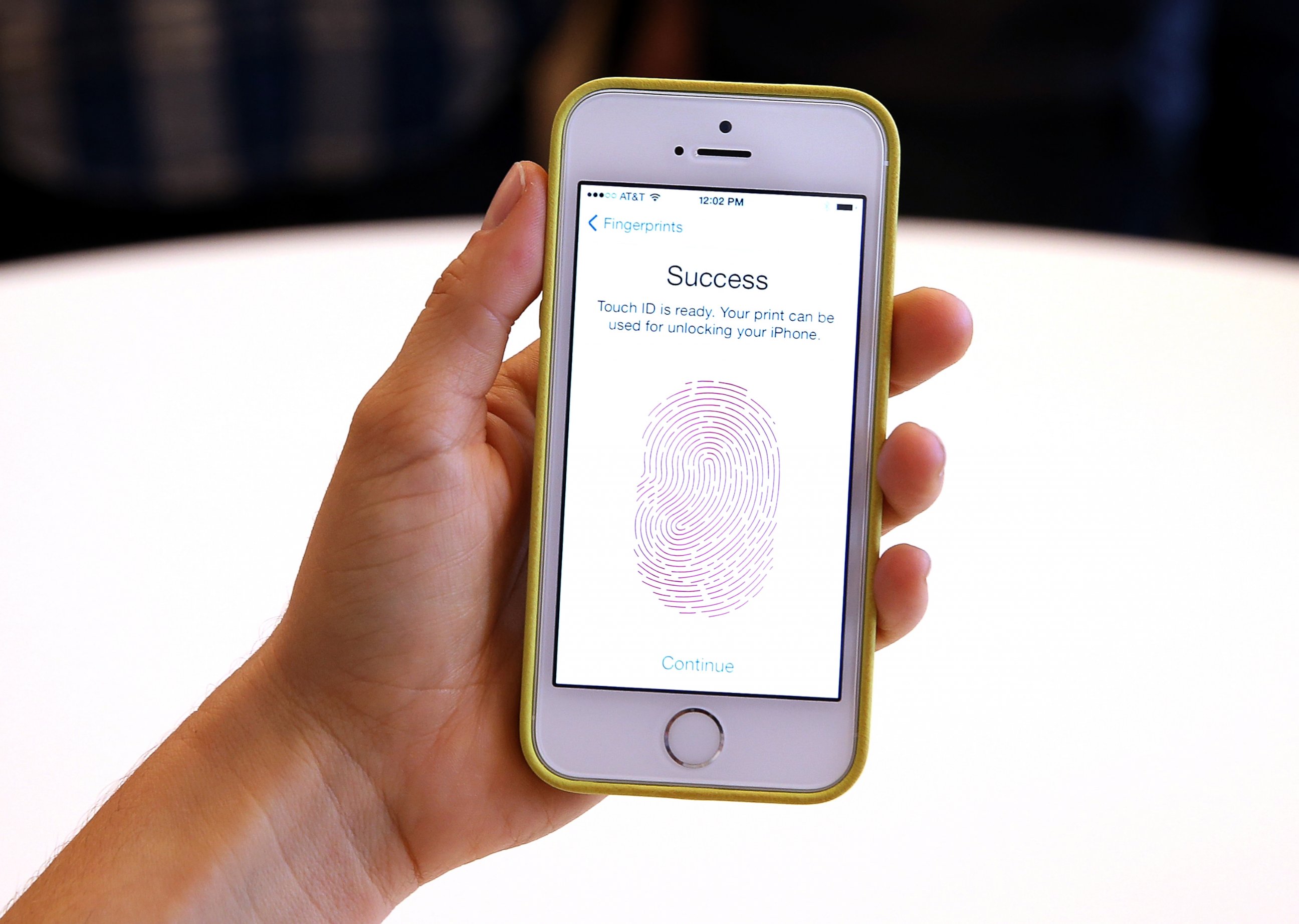 PHOTO: The new iPhone 5S with fingerprint technology is displayed during an Apple product announcement at the Apple campus, Sept. 10, 2013, in Cupertino, Calif.