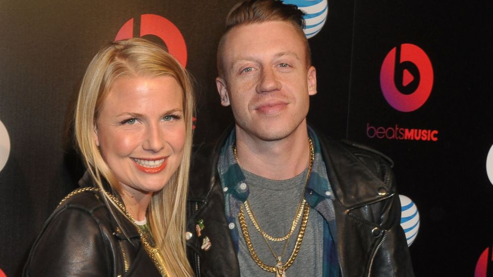 Recording artist Macklemore and fiance Tricia Davis arrive at the Beats Music Official Launch Party at Belasco Theatre, Jan. 24, 2014, in Los Angeles.