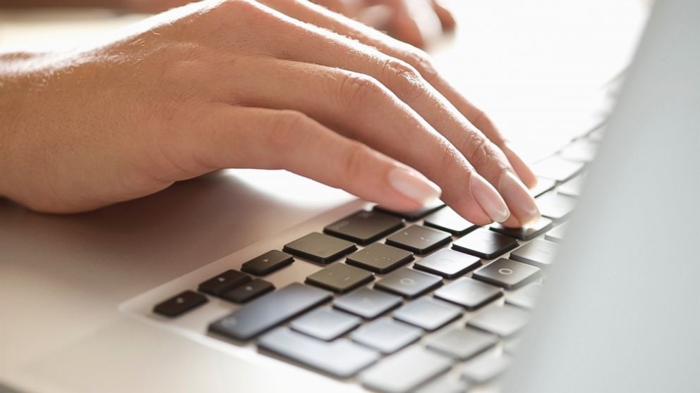 PHOTO: A woman is pictured typing on a laptop in this stock image.