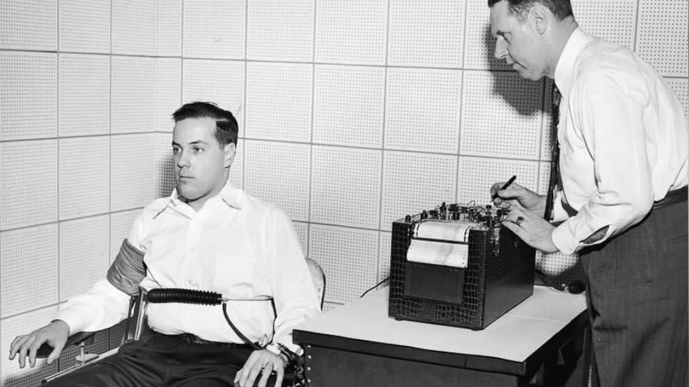 PHOTO: American inventor John Larson (1892 - 1983) at right, demonstrates the operation of a polygraph or 'lie detector' at Northwestern University, Evanston, Ill., 1930s. 