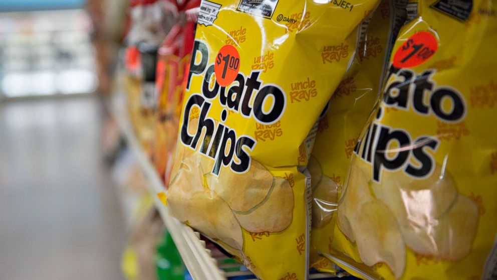 Bags of potato chips sit on display for sale in a supermarket in Princeton, Ill., July 2, 2014.