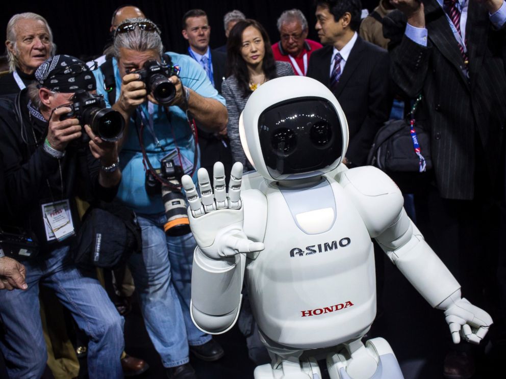 PHOTO: Honda Motors demonstrates its Asimo robot during a media preview of the 2014 New York International Auto Show in New York. The show opens with a sneak preview to the public April 18 and runs through April 27.