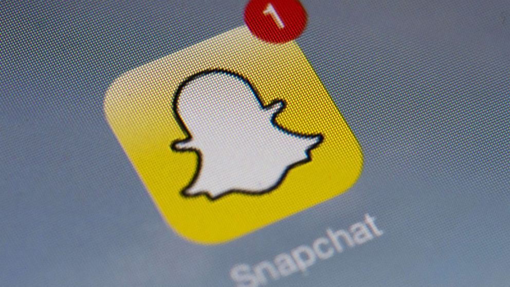 Snapchat's logo is displayed on a tablet on Jan. 2, 2014 in Paris. 