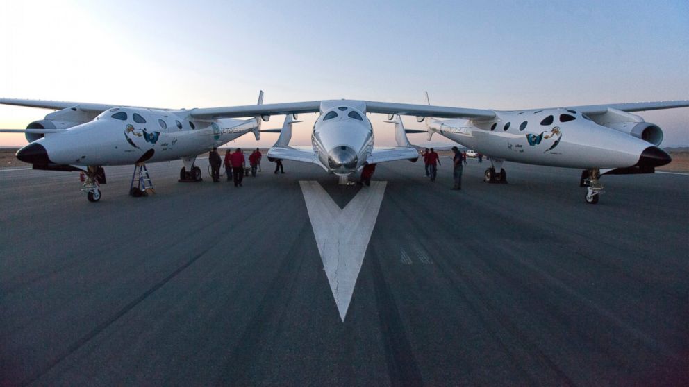PHOTO: Virgin Galactic White Knight Two carries SpaceShipTwo for the first rocket powered flight (PF01) since the beginning of the program that began in 2005 in Mojave, Calif., April 29, 2013.