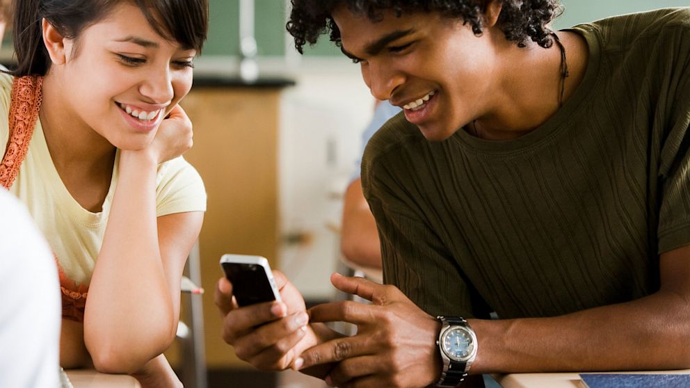 How are cellphones and texting affecting students' educational performance?