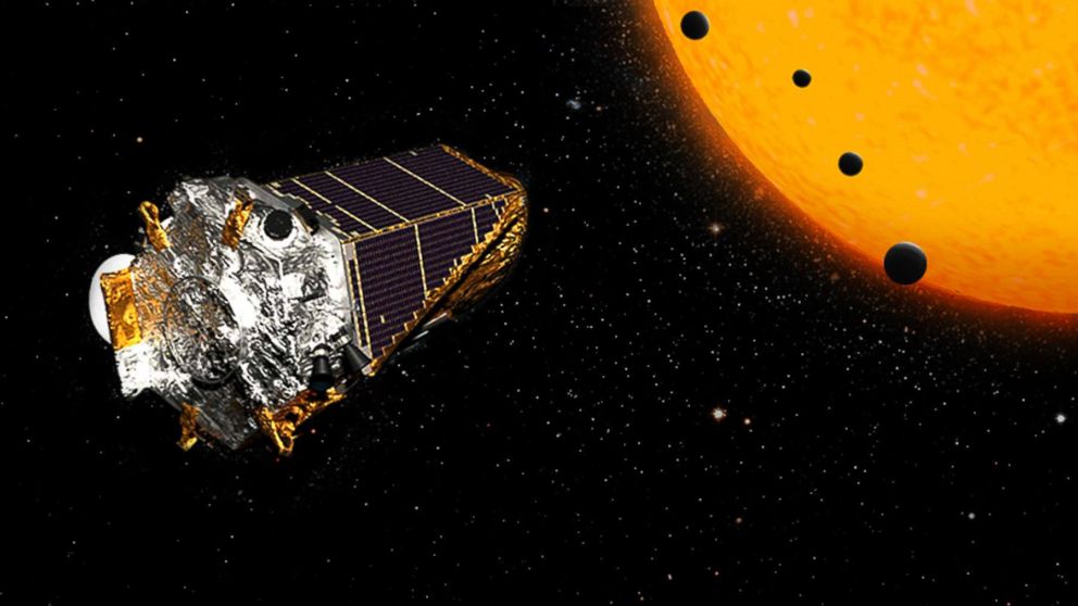 This artist's concept shows NASA's Kepler Space Telescope on its K2 mission. 