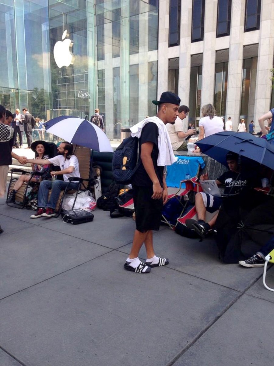 PHOTO: People wait outside of the flagship Apple Store in New York City, hoping to be the first to get their hands on any new electronics Apple may release.