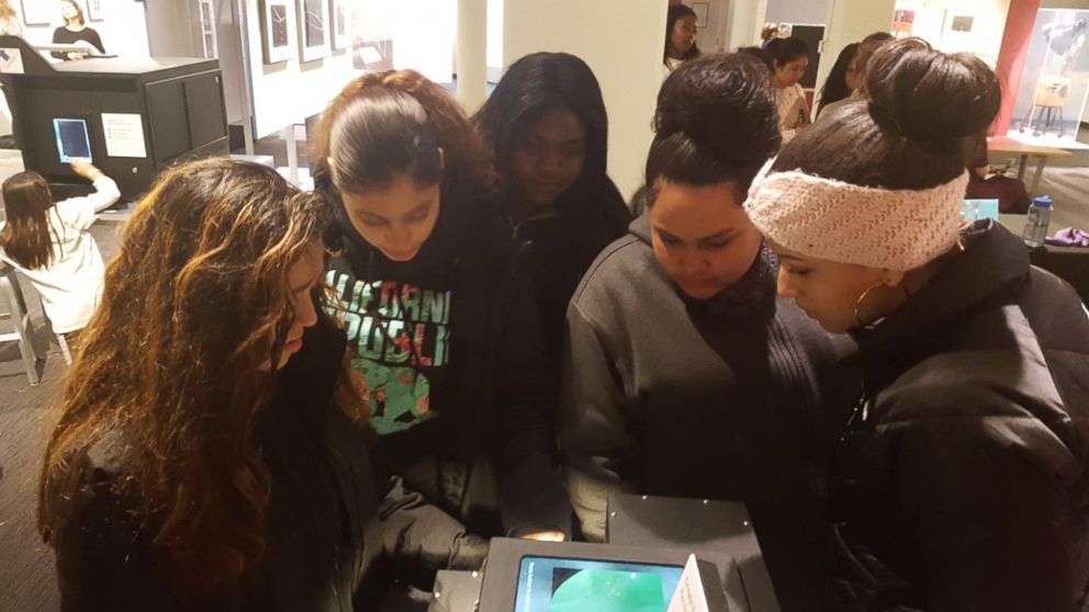 Members of the Girls Who Code club at Brookview Shelter in Dorchester, Massachusetts, are pictured here during a field trip to the Massachusetts Institute of Technology (MIT) in Cambridge, Massachusetts. 