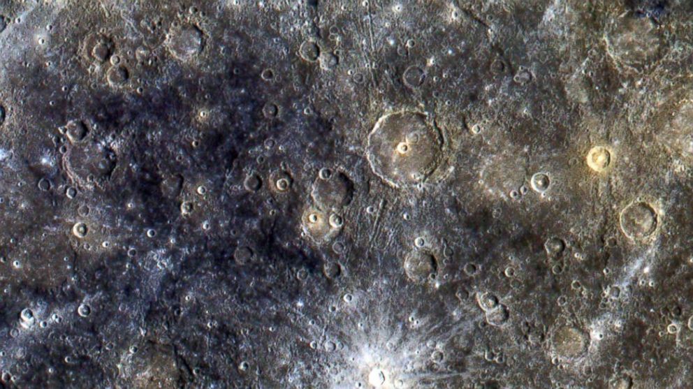 Mercury's surface is seen in exaggerated color in this image provided by NASA.