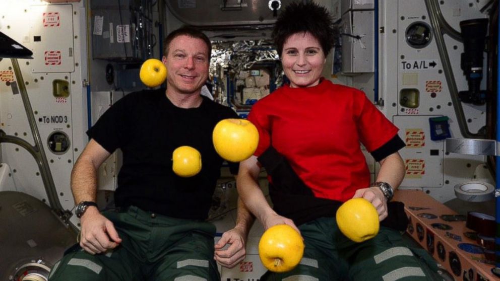 NASA astronaut Terry W. Virts posted this photo to Twitter, Jan. 18, 2015, with the caption: &quot;Enjoying Opal Apples with @astrosamantha. A real treat to have fresh fruit!&quot;