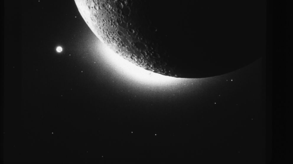 Apollo astronauts attempting to observe a faint glow produced by interstellar dust (shown above, in an image from the Clementine spacecraft) also saw mysterious streamers of light on the moon's horizon. 