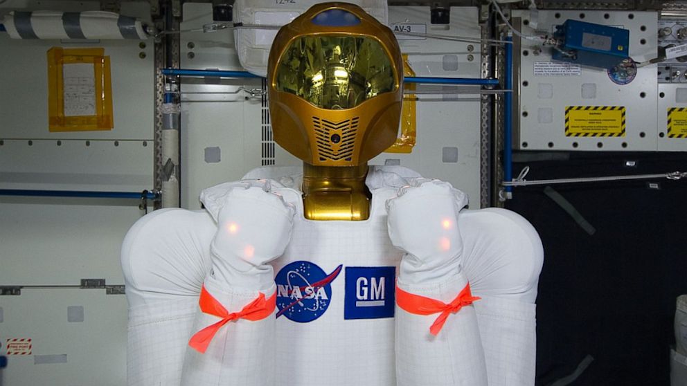PHOTO:  Robonaut is good to go after the power soak. The red ribbon is to remind the crew not to use its arms as handles.
