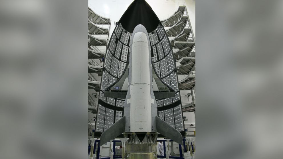 PHOTO: The first X-37B Orbital Test Vehicle waits in the encapsulation cell of the Evolved Expendable Launch vehicle, April 5, 2010, at the Astrotech facility in Titusville, Fla.