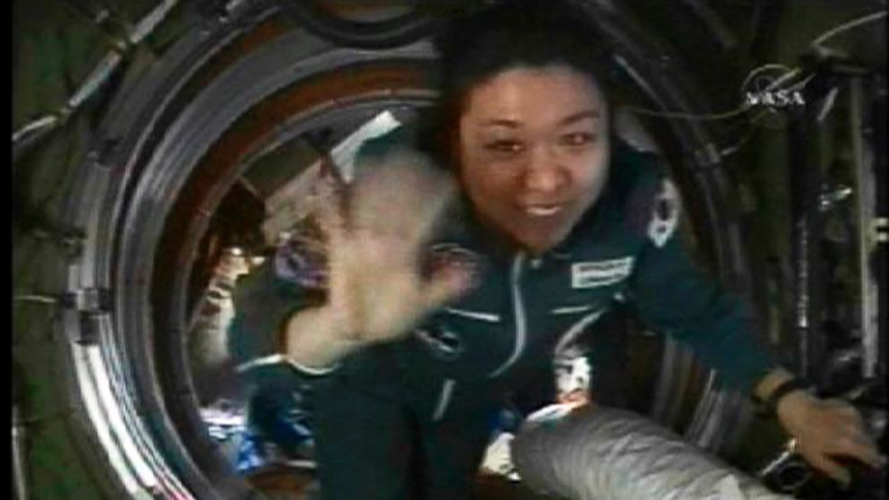 Spaceflight participant So-yeon Yi of Korea enters the International Space Station, April 10, 2008.
