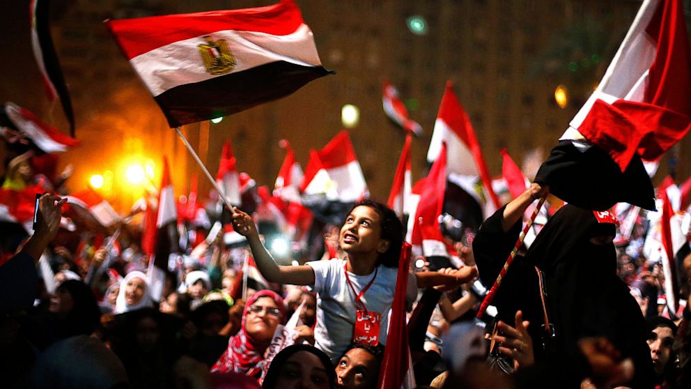 Protesters, who are against Egyptian President Mohamed Morsi, react in Tahrir Square in Cairo July 3, 2013. 