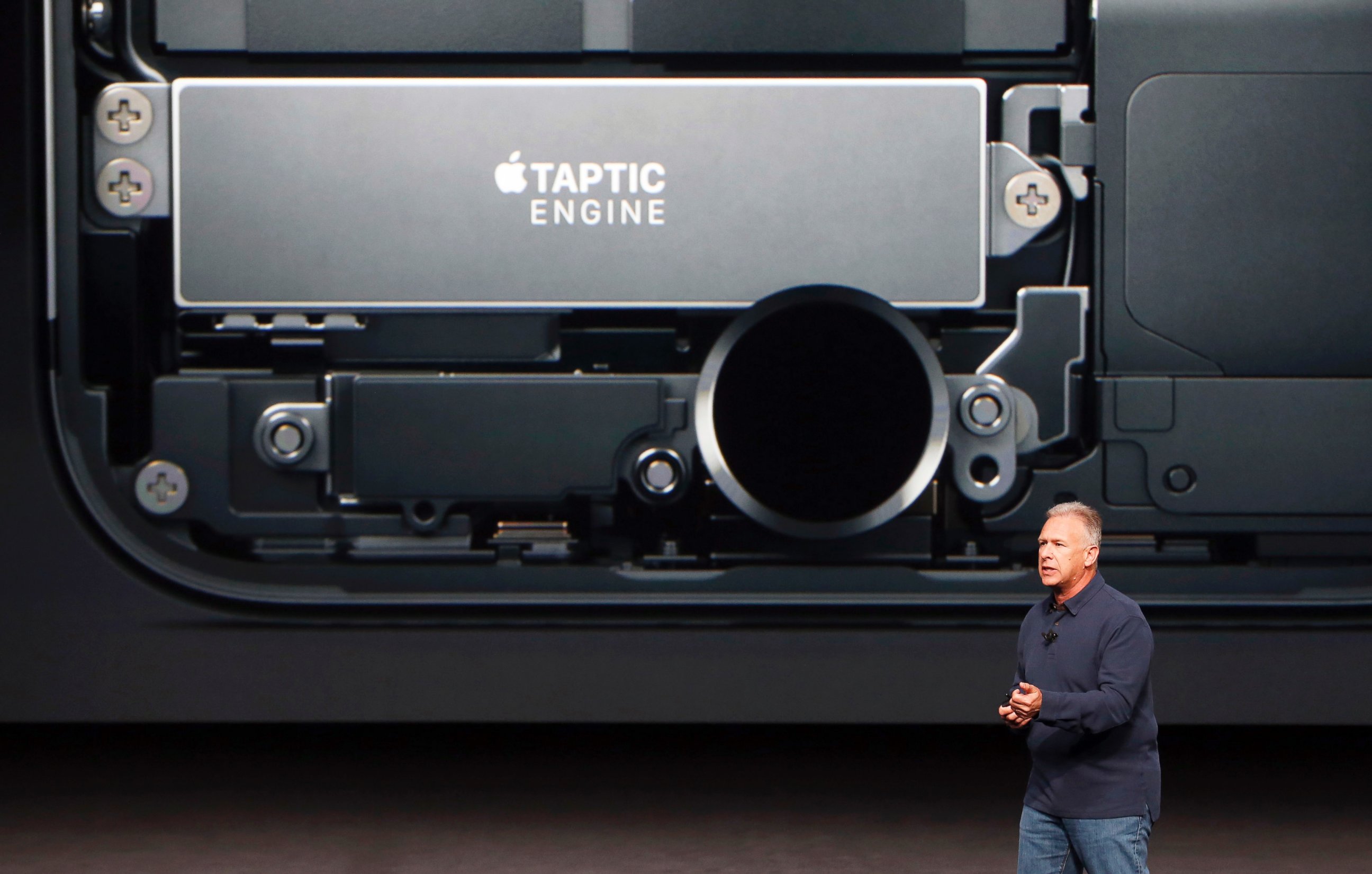PHOTO: Phil Schiller, Senior Vice President of Worldwide Marketing at Apple Inc, discusses the redesigned home button on the iPhone7 during an Apple media event in San Francisco, Sept. 7, 2016.