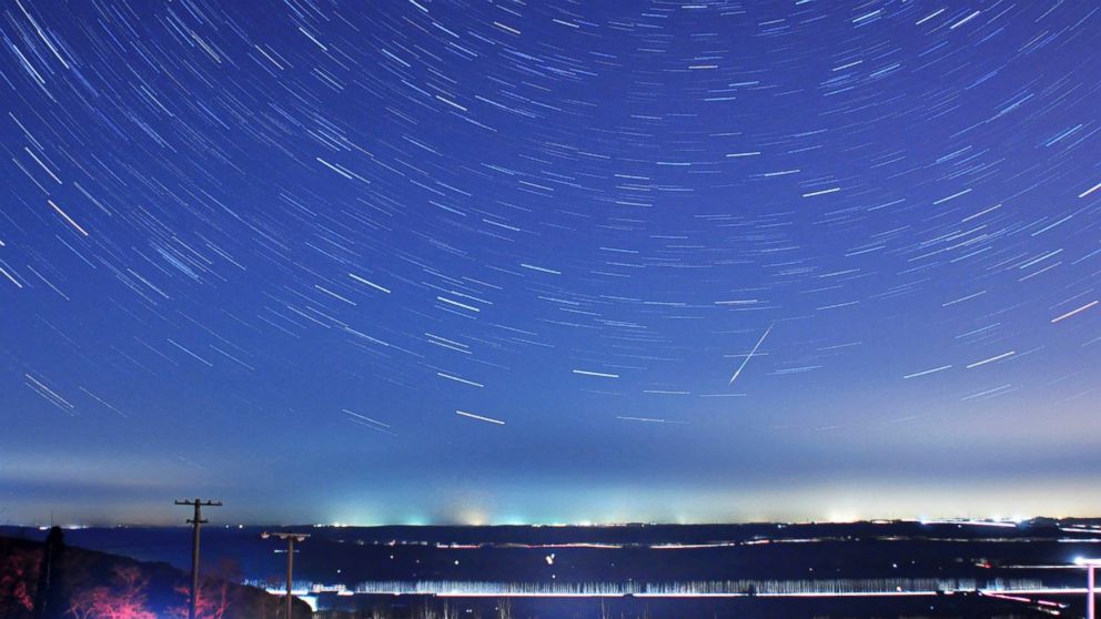 A meteor streaks past stars during the annual Quadrantid meteor shower in Qingdao, Shandong province in China, Jan. 4, 2014.