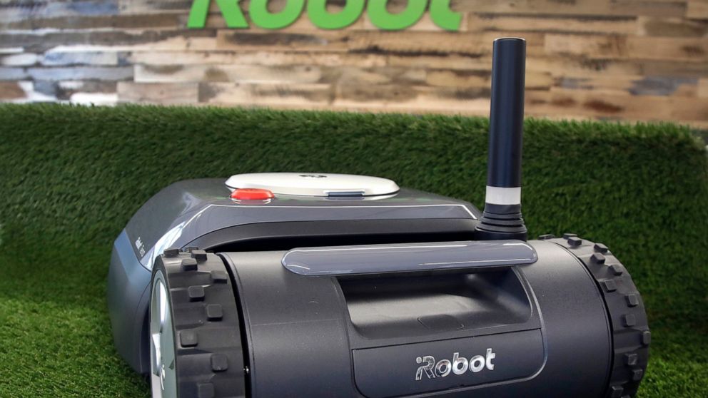 FILE - This Wednesday, Jan. 16, 2019 file photo shows an iRobot Terra lawn mower in Bedford, Mass. Amazon on Friday, Aug. 5, 2022, announced it has entered into an agreement to acquire the iRobot for approximately $1.66 billion. The company sells its