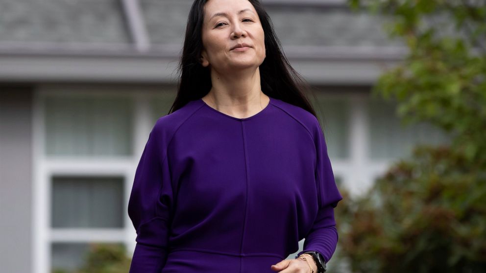 FILE - Meng Wanzhou, chief financial officer of Huawei, leaves home to attend what is expected to be the final day of her extradition hearing at B.C. Supreme Court, in Vancouver, on Wednesday, Aug. 18, 2021. U.S. prosecutors are prepared to resolve c
