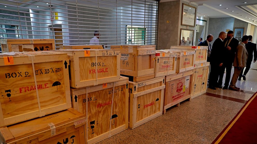 Boxes containing recovered looted artifacts sit temporarily at the foreign ministry before being transferred to the Iraq Museum, in Baghdad, Iraq, Tuesday, Aug. 3, 2021. Over 17,000 looted ancient artefacts recovered from the United States and other 
