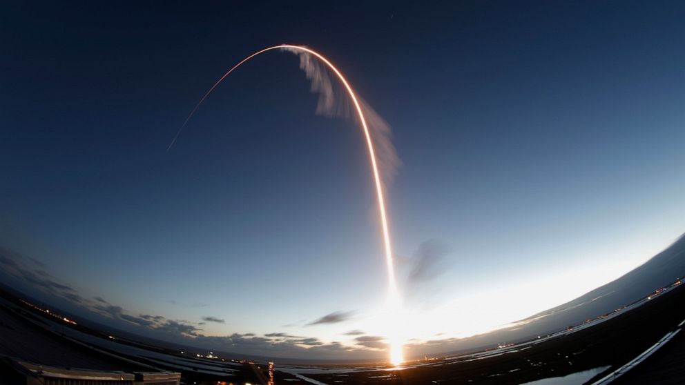 A time exposure of the United Launch Alliance Atlas V rocket carrying the Boeing Starliner crew capsule on an Orbital Flight Test to the International Space Station lifts off from Space Launch Complex 41 at Cape Canaveral Air Force station, Friday, D