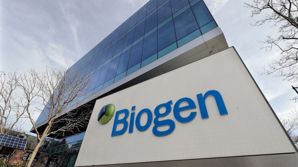 FILE - The Biogen Inc., headquarters is shown March 11, 2020, in Cambridge, Mass. Biogen is slashing the price of its Alzheimer’s treatment months after the drug debuted to widespread criticism for an initial cost that can reach $56,000 annually. The