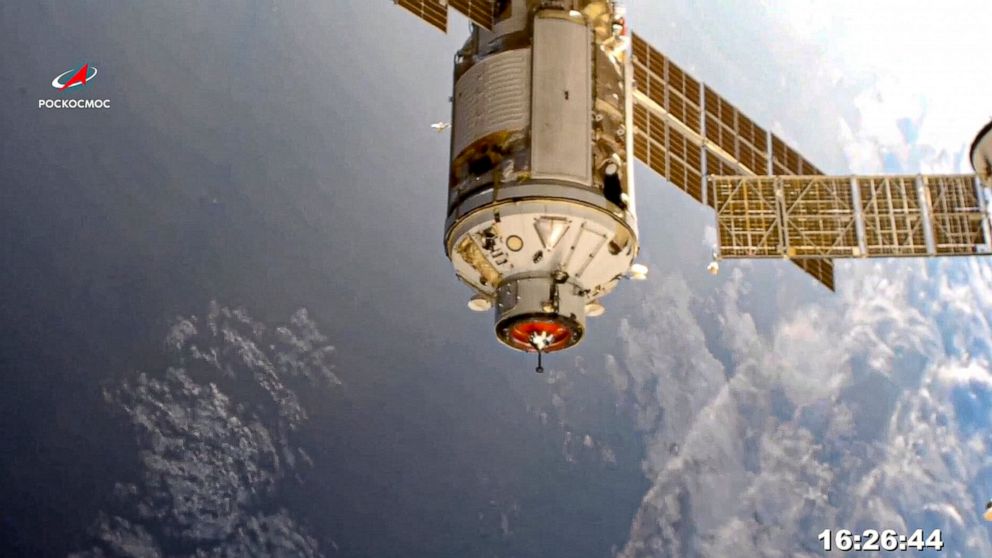 In this photo provided by Roscosmos Space Agency Press Service, the Nauka module is seen prior to docking with the International Space Station on Thursday, July 29, 2021. Russia's long-delayed lab module successfully docked with the International Spa